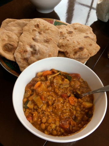 Dinner! Homemade naan and coconut lentil curry.